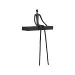Moveable Man On Short Shelf , Sitting, A
